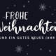 "Frohe Weihnachten" auf dunkelblauem Hintergrund umgeben von Sternen und Planeten