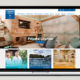 Laptop zeigt die Website einer privaten Lounge mit ansprechendem Design.