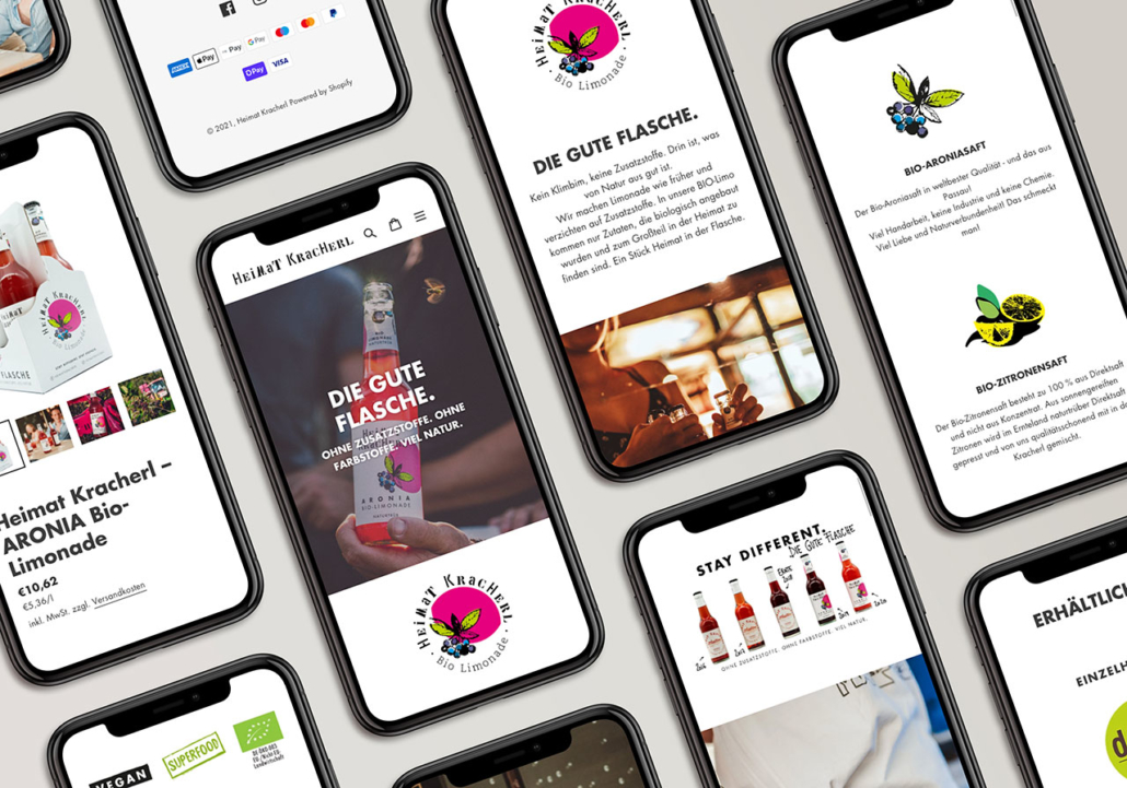 Verschiedene Smartphones mit der Website von Heimat Kracherl und Bio-Limonade.