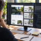 Mann arbeitet an Website-Design für Pflanzgefäße auf großem Monitor.